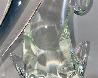 Lot 5140. $60.00 Murano Glass Dolphin by Formia Vetri Di Murano. Beautiful, clear and blue. Sold as is, has a chip in one of the fins, but it was too cool to not include. 16" H  x 10" D x 5"W   Has sold for $195 online, so our slightly injured dolphin is well-priced, as he is GORGEOUS.