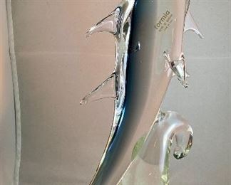 Lot 5140. $60.00 Murano Glass Dolphin by Formia Vetri Di Murano. Beautiful, clear and blue. Sold as is, has a chip in one of the fins, but it was too cool to not include. 16" H  x 10" D x 5"W   Has sold for $195 online, so our slightly injured dolphin is well-priced, as he is GORGEOUS.