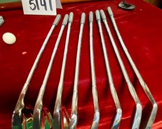 Lot 5141. $75.00. History of Golf Framed Art. Hand Signed C. Burton 1988. Signed and Numbered,  #944/1000. AND Novelty MINIATURE Golf clubs and Cart w/steel shafts Including 4 woods, Irons, Sand wedge and putter and a bag on wheels. Balls too.  Scotch Whisky or Old Andrews label on the bag.  Nice addition to your man cave!