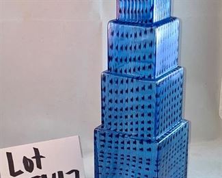 Lot 5147. $275.00 VERY Fine Kosta Boda Metropolis Art Glass Vase designed by Bertil Vallien for Kosta Boda #40026. Blue and Black. With original box. Really cool, looks like a skyscraper. Same one recently sold online for $369.00.  Excellent shape. 12" H x 3.25" W at the base. 	