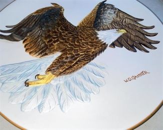 Lot 5148. $30.00  Eagle Package. Pewter Bald Eagle on Wood Base (5.5"h x 4" sq base), Limited Edition 11" bald eagle plate by W.D. Galther 1995 (in relief).  The Pewter Eagle sells for $39.99 alone...