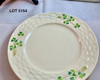 Lot 5154. $46.00. Belleek Ireland Trio. Includes: Small Shamrock Plate (7.25"dia), a sweet Marriage Blessings  Plate (8.5"),  and a Shamrock Picture Frame with a wood backing and 5x7" opening. 