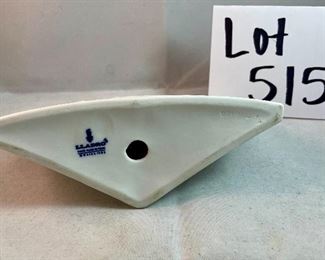 Lot 5157.  $115.00. A lovely Lladro lot includes a 1985- Lladro Collectors Society Don Quixote Plaque (6"wx4"h) with a shell design on the back. 1984 Lladro Cat 'n Mouse (2.5"hx3"w) figurine, and a Porcelain "Nosegay" 4.5" x 2"h. Little wooden stand not included. 