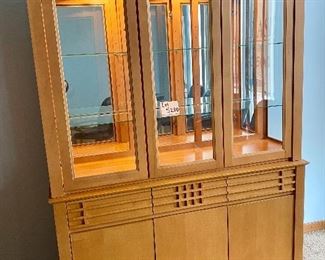 Lot 5200. $795.00  MCM/Arts and Craft Style Lit Buffet/Display cabinet. Maple w/2 glass shelves, 3 drawers and 3 Door Cabinet. Made in Canada. 82" H x 58" W x 19"D.