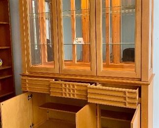 Lot 5200. $795.00  MCM/Arts and Craft Style Lit Buffet/Display cabinet. Maple w/2 glass shelves, 3 drawers and 3 Door Cabinet. Made in Canada. 82" H x 58" W x 19"D.