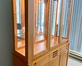 Lot 5200. $795.00  MCM/Arts and Craft Style Lit Buffet/Display cabinet. Maple w/2 glass shelves, 3 drawers and 3 Door Cabinet. Made in Canada. 82" H x 58" W x 19"D.