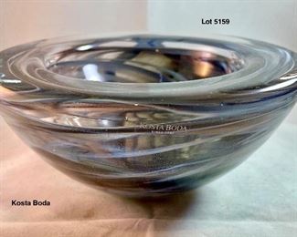 Lot 5159. $35.00. Kosta Boda "Atoll" Smoky Art Glass Bowl in gray by Anna Ehrner w/box. 3"h x 7"w opening has a 4.5" dia. Have 1 remaining (one box is for an aqua atoll bowl, not the gray).