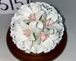 Lot 5157.  $115.00. A lovely Lladro lot includes a 1985- Lladro Collectors Society Don Quixote Plaque (6"wx4"h) with a shell design on the back. 1984 Lladro Cat 'n Mouse (2.5"hx3"w) figurine, and a Porcelain "Nosegay" 4.5" x 2"h. Little wooden stand not included. 