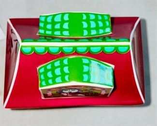 Lot 5165. $95.00. Bjorn Wiinblad for Rosenthal's studio-linie, made in Germany covered porcelain jar "Scenes from a Window" series. Covered box with a Dutch inscription on the back. Two black lacquered hinged boxes (2.75"l x 2"w)