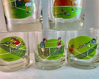 Lot 5166. $88.00. Tennis: The game where love measures nothing! This lot is made up of a mix for apres the match. A pewter Kelermes from Sheffield 6oz hip flask with a Tennis player, and 6 vintage Ashby tennis low ball glasses will help things get started, then admire an Orrefors crystal tennis ball 3.5"dia. 