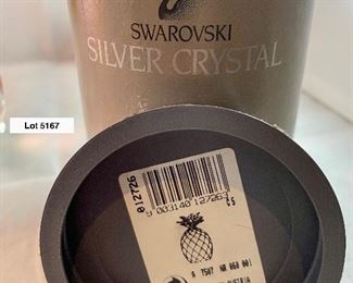 Lot 5167. $70.00. This lot includes a sweet Swarvoski Crystal Pineapple with original box, #012726. This is from the shimmering fruit collection. Great condition. 4"h x 2.5"w.