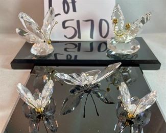 Lot 5170. $60.00. Lot of 4 Swarovski Crystal Butterflies and 1 inspired butterfly. Lg. 2"h x 2"w x 2.25"d (antenna was reattached), Marked med: 2"h x 1.75"w x 2"d, 2 small: 1.25"w x 1"h x 1"d, unmarked med: 3"w x 1"h.