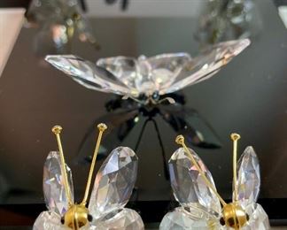 Lot 5170. $60.00. Lot of 4 Swarovski Crystal Butterflies and 1 inspired butterfly. Lg. 2"h x 2"w x 2.25"d (antenna was reattached), Marked med: 2"h x 1.75"w x 2"d, 2 small: 1.25"w x 1"h x 1"d, unmarked med: 3"w x 1"h.