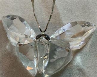 Lot 5170. $60.00. Lot of 4 Swarovski Crystal Butterflies and 1 inspired butterfly. Lg. 2"h x 2"w x 2.25"d (antenna was reattached), Marked med: 2"h x 1.75"w x 2"d, 2 small: 1.25"w x 1"h x 1"d, unmarked med: 3"w x 1"h.