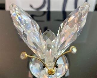 Lot 5170. $60.00. Lot of 4 Swarovski Crystal Butterflies and 1 inspired butterfly. Lg. 2"h x 2"w x 2.25"d (antenna was reattached), Marked med: 2"h x 1.75"w x 2"d, 2 small: 1.25"w x 1"h x 1"d, unmarked med: 3"w x 1"h.