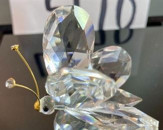 Lot 5170. $60.00. Lot of 4 Swarovski Crystal Butterflies and 1 inspired butterfly. Lg. 2"h x 2"w x 2.25"d (antenna was reattached), Marked med: 2"h x 1.75"w x 2"d, 2 small: 1.25"w x 1"h x 1"d, unmarked med: 3"w x 1"h.
