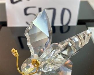 Lot 5170. $60.00. Lot of 4 Swarovski Crystal Butterflies and 1 inspired butterfly. Lg. 2"h x 2"w x 2.25"d (antenna was reattached), Marked med: 2"h x 1.75"w x 2"d, 2 small: 1.25"w x 1"h x 1"d, unmarked med: 3"w x 1"h.