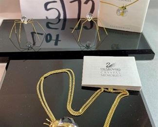 Lot 5172. $40.00. Swarovski Crystal Memories Lady Bug necklace and 2 fun crystal spiders.  The necklace comes in a gift box and has a Swarovski Branded 20" chain