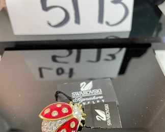 Lot 5173. $38.00. Pair of darling red and crystal Lady Bug Pins, with tags and Swarovski string and felt bags
