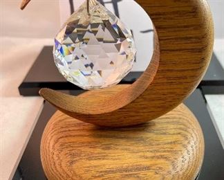 Lot 5175. $30.00. Unique Oak half-moon with faceted crystal (approx 1.75") and 2 faceted crystals with hanging ports Approx 2" in dia. All are unmarked. Hang these puppies in a window and spend your days catching rainbows! 