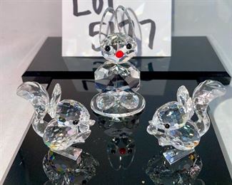 Lot 5177. $42.00. Woodland fun Crystal critters. No boxes. 2 Crystal Zoo by Swarovski squirrels 1.5"h x 1"w, and a larger bunny on crystal base. 2.5"h x 1.75"w (sold as is, is it missing arms? I don't know!).