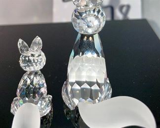 Lot 5178. $43.00. 3 crystal foxes. The Large and Small fox from Crystal Zoo by Swarovski have frosted tails and snouts, both are signed. The 3rd fox looks a little down but is made of faceted crystals on a base (2"h) 
