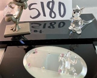 Lot 5180. $18.00. Crikey Mate! Here's our down-under deal! Crystal + pewter Koala in a tree, 2.5"x2.25"w. Super cute Kangaroo with her Joey (has been repaired) by crystal Zoo and lastly a cute airplane (can we call it a Qantas plane just because?) with a mirrored runway 3" long.  All sold as-is. 