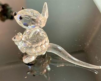Lot 5180. $18.00. Crikey Mate! Here's our down-under deal! Crystal + pewter Koala in a tree, 2.5"x2.25"w. Super cute Kangaroo with her Joey (has been repaired) by crystal Zoo and lastly a cute airplane (can we call it a Qantas plane just because?) with a mirrored runway 3" long.  All sold as-is. 