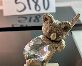Lot 5180. $18.00. Crikey Mate! Here's our down-under deal! Crystal + pewter Koala in a tree, 2.5"x2.25"w. Super cute Kangaroo with her Joey (has been repaired) by crystal Zoo and lastly a cute airplane (can we call it a Qantas plane just because?) with a mirrored runway 3" long.  All sold as-is. 