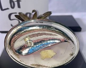 Lot 5186. $90.00. Crystal fun! Swarovski Crystal grape cluster, created as part of the "Sparkling Fruit" theme, faceted clear crystal grapes with gold plated leaves and a stem tip. Swarovski Crystal Strawberry Pin or Pendant with gold-tone leaves, An Unsigned mini elephant, crystal marble, and a trinket tray with a metal palm tree to round out the mix. 