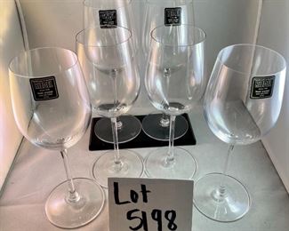 Lot 5198A. $108.00. Set of 6 Reidel Wine Glasses w/a box, but might not the corresponding box. 