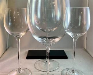 Lot 5199. $72.00. Choose your own adventure wine glasses.  2 substantial Smolleliers Reidel glasses (10.74"t x 3"w at opening) and 2 smaller Reidel (8.25" x 2.5" opening). The smaller glasses have the vintage Reidel Brand on the base. 