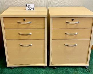 Lot 5204. $190.00 for 2 Birch Color Wood File Cabinets. 2 pencil drawers, 1 file drawer w/lock and key. on casters. 19" W  x 18" D x 26" H. Very attractive Pair of Cabinets. 