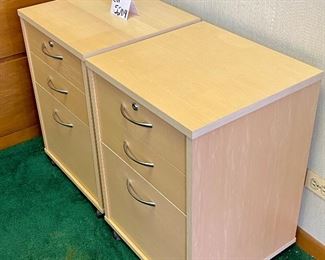 Lot 5204. $190.00 for 2 Birch Color Wood File Cabinets. 2 pencil drawers, 1 file drawer w/lock and key. on casters. 19" W  x 18" D x 26" H. Very attractive Pair of Cabinets. 