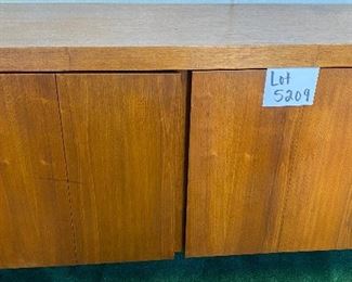 Lot 5209 $1,950.00  Mid Century Modern (MCM) Credenza by Lehigh Leopold Furniture, 4 drawers and 2 bifold cabinet doors with adjustable shelves 77" L  x 17" D x 28.5"H.  Beautiful piece of MCM, needs some Love but will Pop when refinished.  