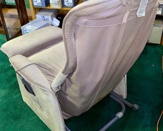 Lot 5213. $235.00  Household Massage Lounger. Massage chair recliner model EP588E features back, neck, and foot massage with multiple settings plus user programmable.  Independent back recline and foot rest operation. Beige Microfiber, plus Panasonic Foot Massager.  32"w x 29"d x 43"tall