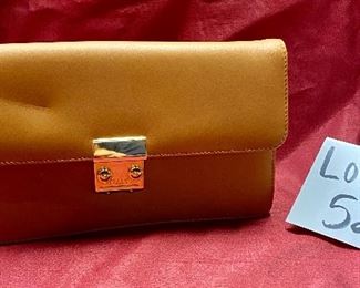 Lot 5215. $38.00. Unbranded Brown Leather Clutch with "Italy" buckle and combination. Condition as shown. Made in Italy? 10"w x 6"tx2"d
