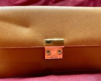 Lot 5215. $38.00. Unbranded Brown Leather Clutch with "Italy" buckle and combination. Condition as shown. Made in Italy? 10"w x 6"tx2"d