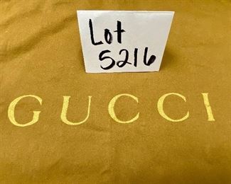 Lot 5216. $18.00. Brown Gucci Storage/Dust Bag	24"w x 17"t. Just the bag. We haven't found any Gucci, yet. 