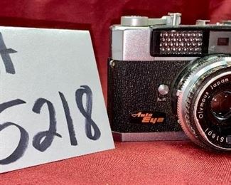 Lot 5218. $95.00. Vintage Olympus Camera Auto Eye- Olympus Japan Lens D.Zuike 1:2.8, F=4.5cm 151801. 
Leather case is in poor condition. 