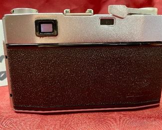 Lot 5218. $95.00. Vintage Olympus Camera Auto Eye- Olympus Japan Lens D.Zuike 1:2.8, F=4.5cm 151801. 
Leather case is in poor condition. 