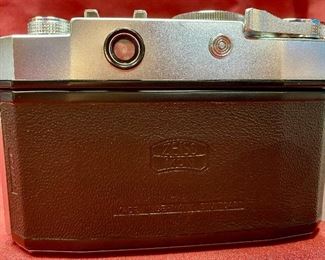 Lot 5219. $125.00. Contina Prontor SVS Zeis Iron Film Camera. Made in Germany with Brown Leather Case. Novicar-Anastig mat Lens 1:28, 5=45mm