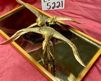 Lot 5221. $75.00. 3 Geese in Flight Brass Sculpture 10"w x 9"d x7"t. The Flight by Gunther R Granget, wood base w/mirror. 1981. Cast with 24 karat gold vermeil over solid American pewter. No box included.	15"w x 7.25"d