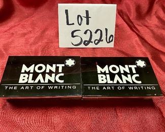 Lot 5226. $35.00 /pair. Pair of Montblanc Acryllic Display Blocks "The Art of Writing"	2.75" x 4" W x 1.5" D	