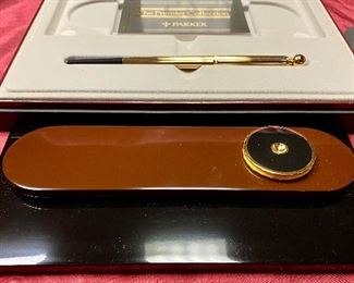 Lot 5232. $75.00 Parker Premier Collection Desk set with Electroplated Gold Pen with Jet Crystal Base: 12" L x  3" W
