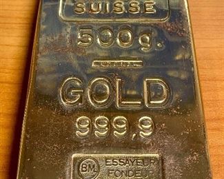 Lot 5236.$32.00.  Credit Suisse 500g Gold 999.9 Replica (5"l x 3"w) Paired with a crystal globe on base (10"l x 4"w x 3"dia)