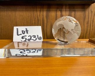 Lot 5236.$32.00.  Credit Suisse 500g Gold 999.9 Replica (5"l x 3"w) Paired with a crystal globe on base (10"l x 4"w x 3"dia)