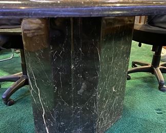 Lot 5008 $700.00  5'10" Black Oval Conference Table, metal with marble look and matching base. 44" W  x 70" L X 30" H. Solid construction with a modern look.  Chairs are in a separate lot.  