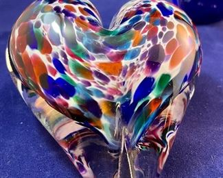 Lot 5126. $60.00  3 art glass pieces, 2 are signed.  1 Murano style heart from 2001 (4"long),  iridescent egg (3" H), and 1 blue hanging heart with lovely iridescent sheen and hanging area (for window or a tree)