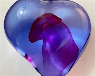 Lot 5128. $300.00. Kosta Boda Swedish Studio Art Glass pair, the first item is a Kosta Boda  by Gorän Warff Crystal Vase with contemporary beautiful lines and striking colors (11"t x 4"w) #49809, and a Kosta Boda heart beat art glass paperweight (3"x3"x1") by Bertil Vallien #90117 (both with boxes)